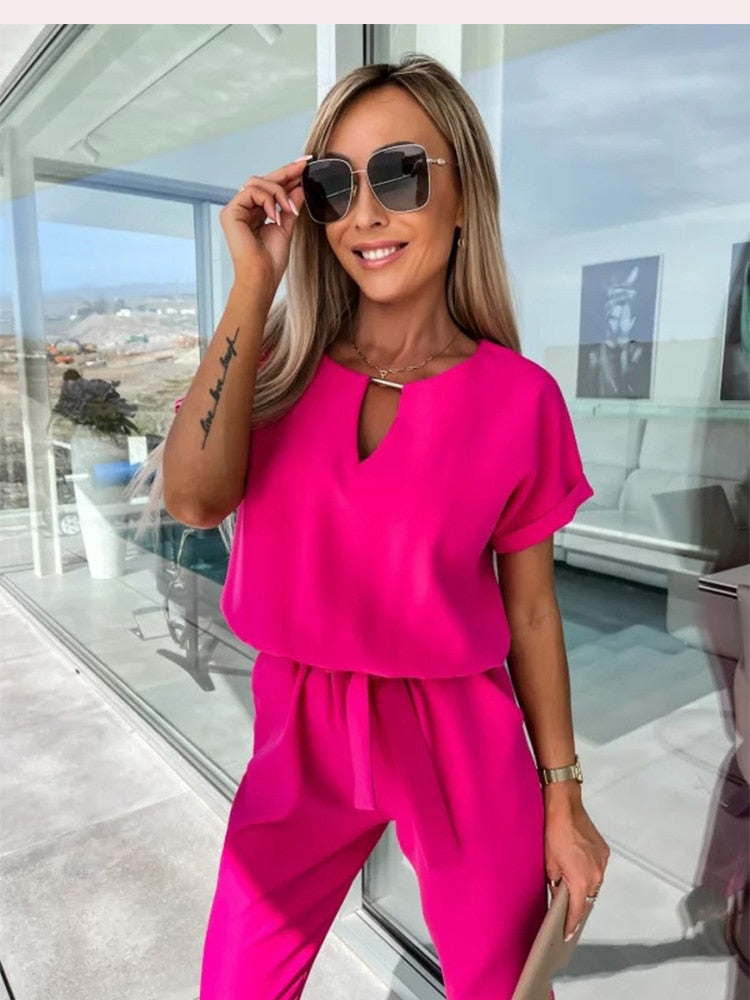 Dames Jumpsuit Korte Mouw met V-hals en Strikceintuur