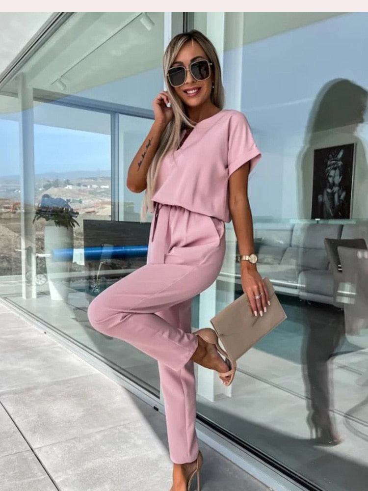 Dames Jumpsuit Korte Mouw met V-hals en Strikceintuur