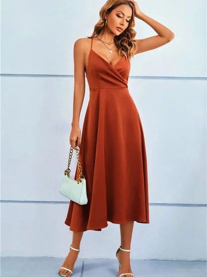 Dames Midi Jurk met V-hals en Gekruiste Spaghettibandjes en Strikdetail op de Rug
