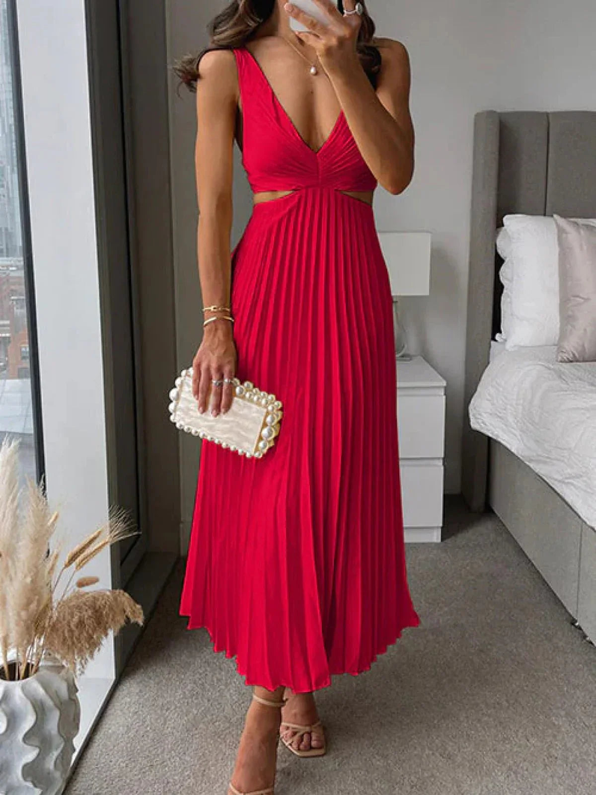 Dames Mouwloze Midi Jurk met V-hals en Geplooide Rok en Cut-out Taille