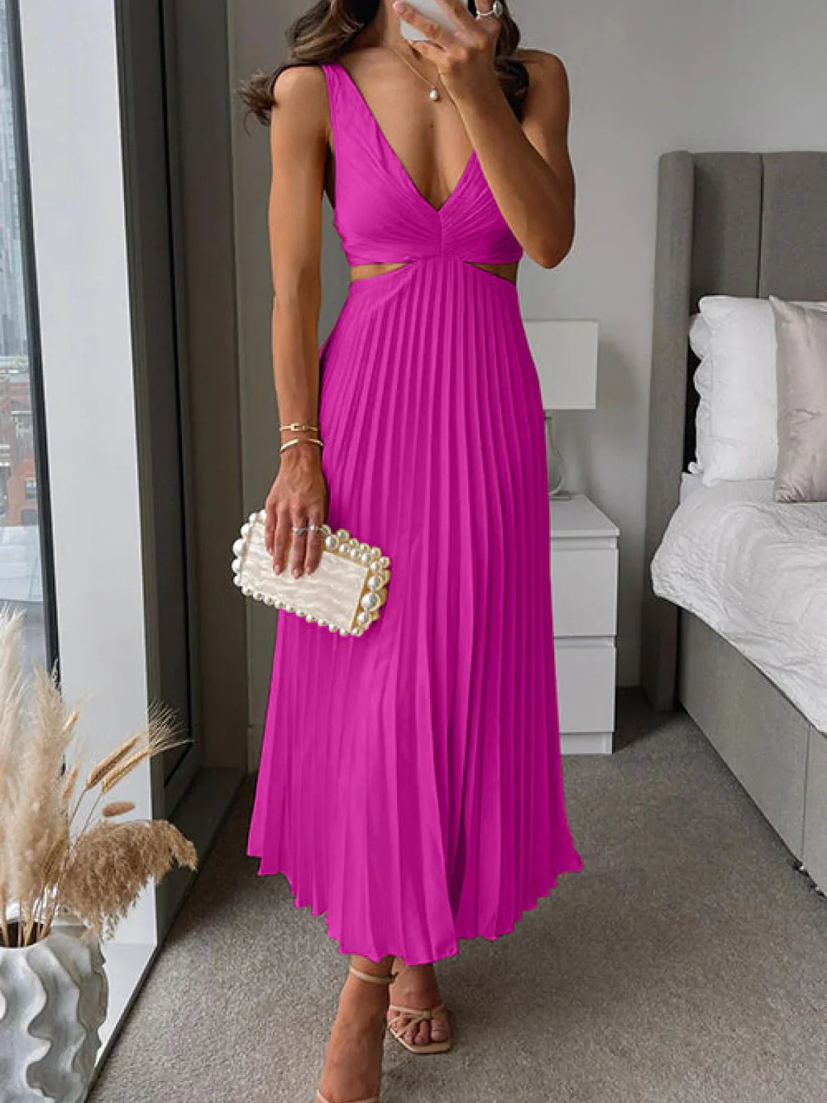 Dames Mouwloze Midi Jurk met V-hals en Geplooide Rok en Cut-out Taille